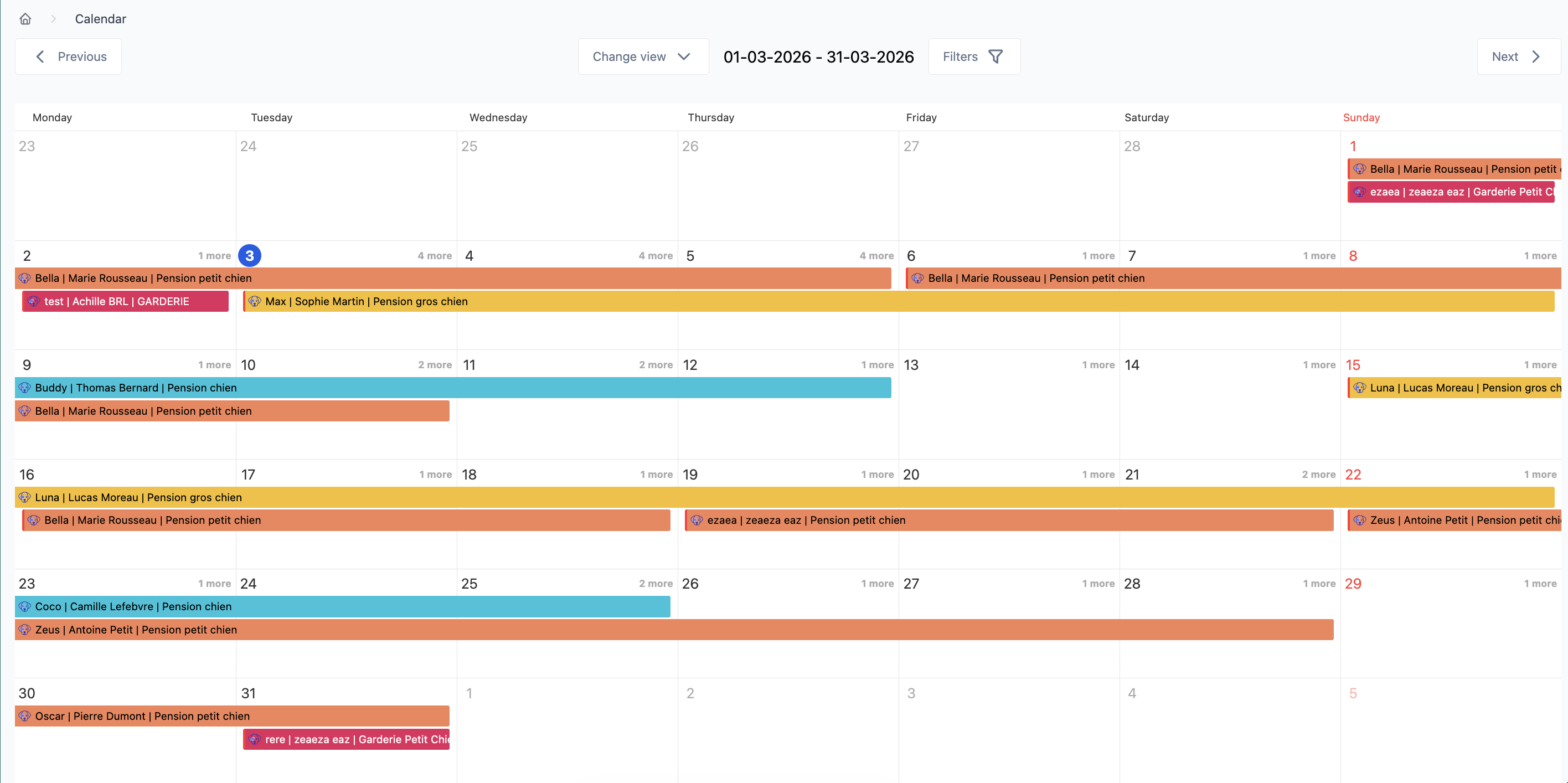 Animalo monthly calendar: color-coded pet boarding and daycare bookings across March 2026